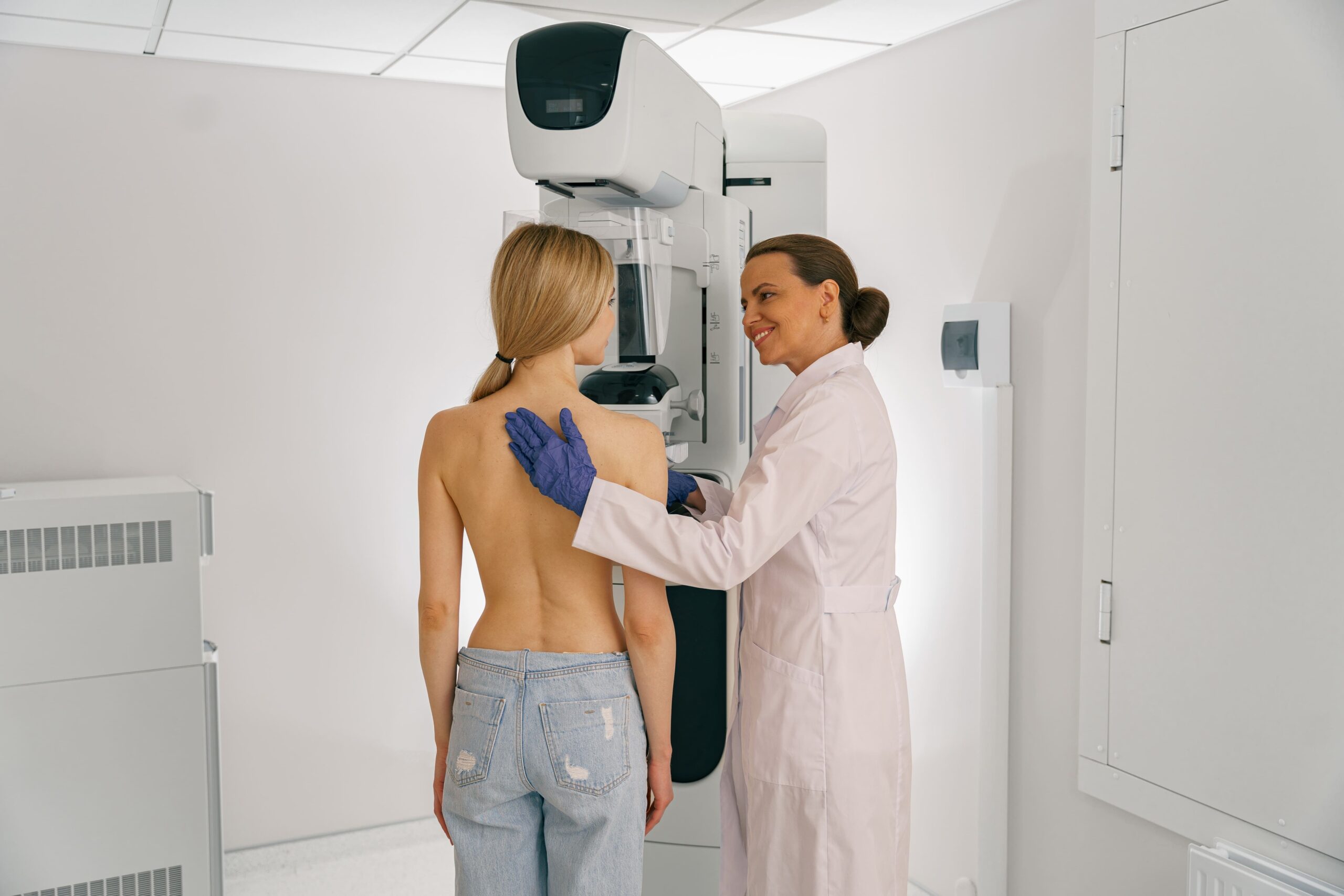 A young lady getting a mammogram in a leading breast cancer screening clinic